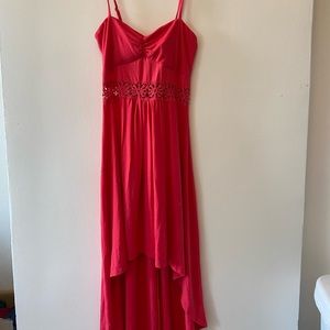 Raspberry red high-low summer dress with crocheted detail